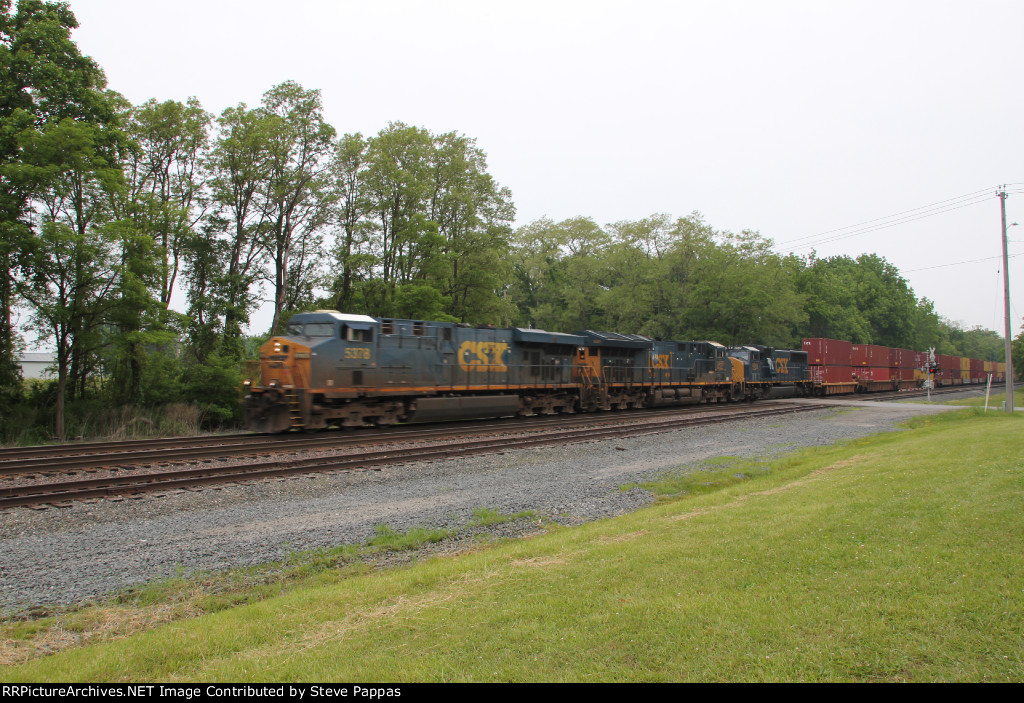 CSX 5378 takes a train west through Westfield New York.